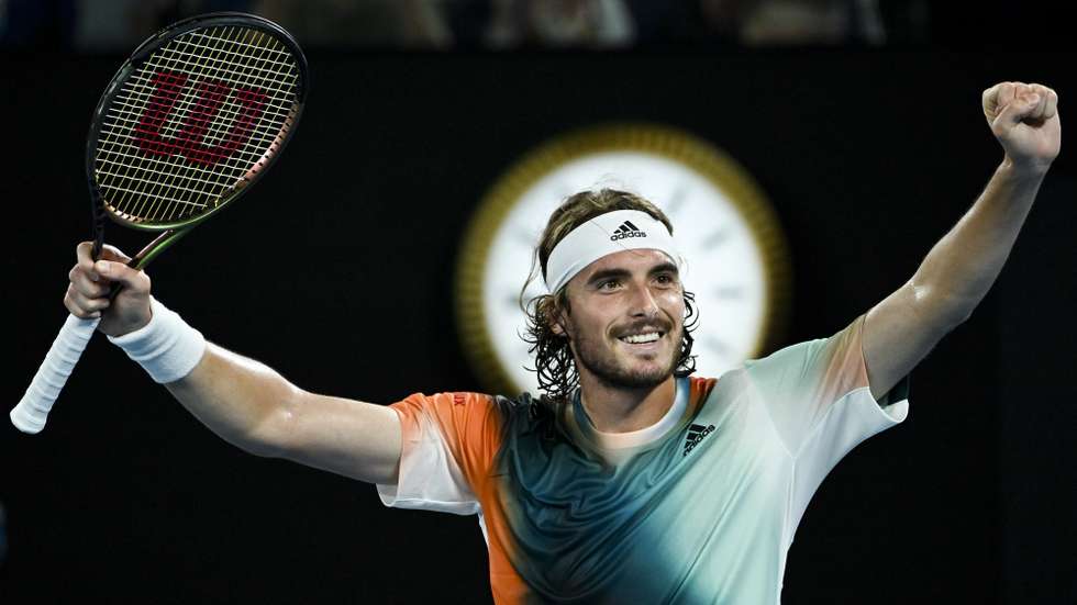 epa09709834 Stefanos Tsitsipas of Greece celebrates after winning his Men’s quarterfinal match against Jannik Sinner of Italy at the Australian Open Grand Slam tennis tournament at Melbourne Park, in Melbourne, Australia, 26 January 2022.  EPA/DEAN LEWINS AUSTRALIA AND NEW ZEALAND OUT