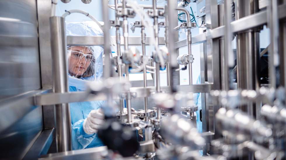 epa09000800 A handout photo made available by German pharmaceuticals company BioNTech shows an employee at work in the facility for the mRNA prouction in the Biontech factory in Marburg, Germany, 20 January 2021 (issued 10 February 2021). According to a press release issued on 10 February 2021, BioNTech started at the Marburg facility the production of mRNA, the active pharmaceutical ingredient of the Pfizer-BioNTech COVID-19 vaccine.  EPA/BIONTECH SE HANDOUT  HANDOUT EDITORIAL USE ONLY/NO SALES