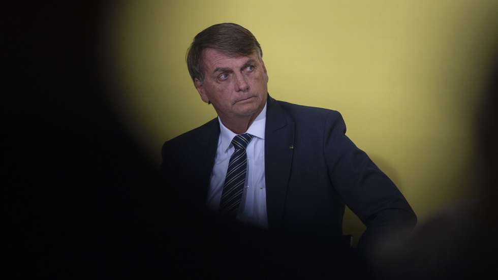 epa09849213 The president of Brazil, Jair Bolsonaro, participates in a ceremony for the Launch of New Deliveries of the Income and Opportunity Program at the Palacio do Planalto, in Brasilia, Brazil, 25 March 2022.  EPA/Joedson Alves