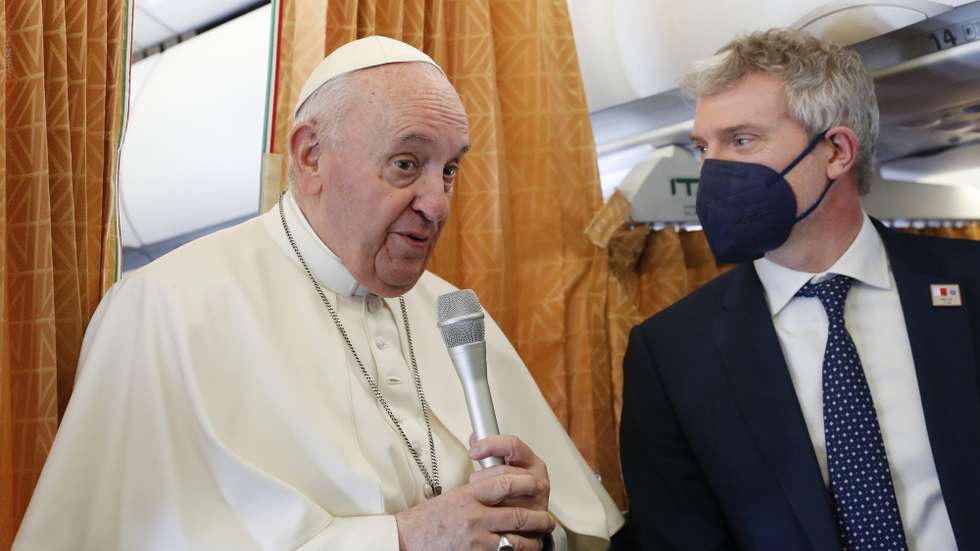 epa09865081 Pope Francis speaks aboard the plane on his way to Malta International Airport, ahead of his apostolic visit in Luqa, Malta, 02 April 2022.  EPA/REMO CASILLI / POOL