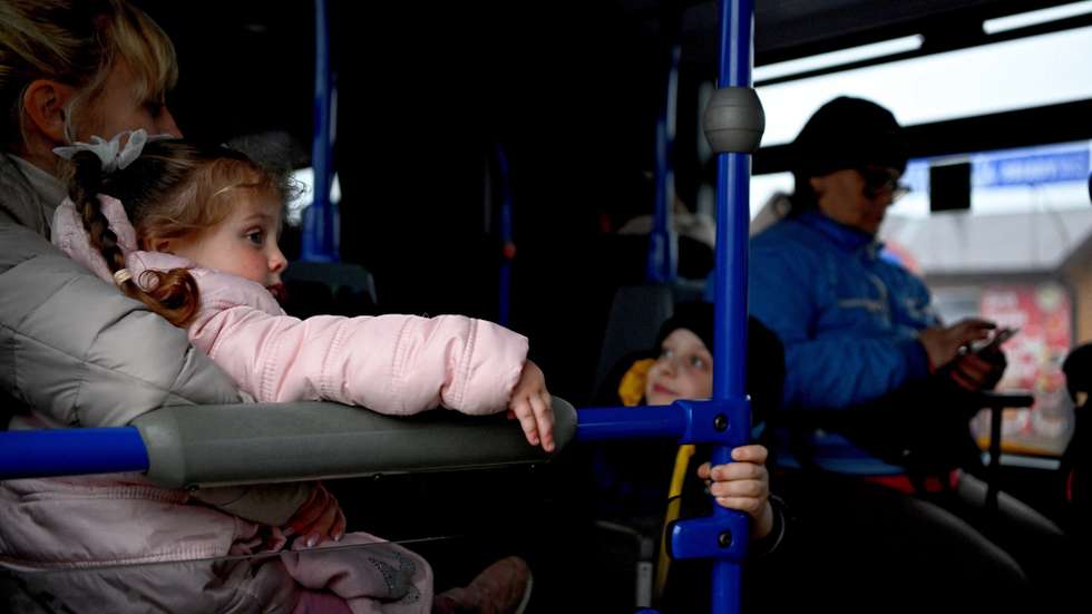 epa09863347 War refugees from Ukraine arrive at the Polish-Ukrainian border crossing in Medyka, Poland, 01 April 2022. The number of people fleeing to Poland due to Russia's invasion of Ukraine is decreasing. On 24 February Russian troops had entered Ukrainian territory in what the Russian president declared a 'special military operation', resulting in fighting and destruction in the country, a huge flow of refugees, and multiple sanctions against Russia.  EPA/DAREK DELMANOWICZ POLAND OUT