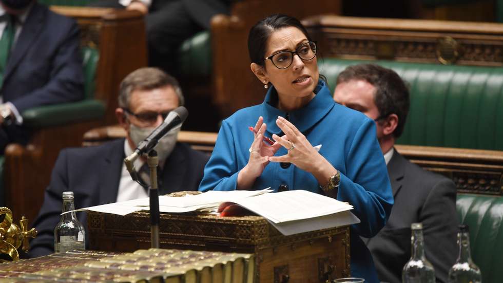 epa09602703 A handout photograph released by the UK Parliament shows British Home Secretary Priti Patel speaking on the small boats incident in the Channel, in the House of Commons in Westminster, London, Britain, 25 November 2021.  EPA/UK PARLIAMENT/JESSICA TAYLOR HANDOUT  HANDOUT EDITORIAL USE ONLY/NO SALES