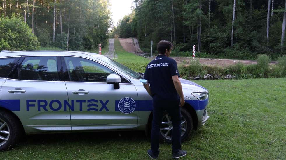 epa09353882 A member of the European Union border agency Frontex  in Kapciamiestis BCU, Lithuania, 19 July 2021. The European Union border agency Frontex is deploying 60 border guards to control the flows of illegal migrants from Belarus crossing the Lithuanian border. Over 1,900 migrants have been detained in Lithuania so far this year. Most of the migrants are from Iraq who have flown to Belarus on direct flights from Baghdad and Istanbul.  EPA/STR