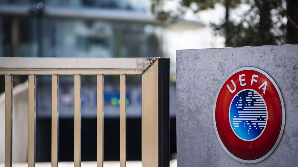 epa09792280 (FILE) - The UEFA logo is pictured at the entrance of the UEFA Headquarters, in Nyon, Switzerland, 17 March 2020 (re-issued on 28 February 2022). The European football governing body UEFA announced on 28 February 2022 to have ended its partnership with Gazprom across all competitions. 'The decision -announced UEFA- is effective immediately and covers all existing agreements including the UEFA Champions League, UEFA national team competitions and UEFA EURO 2024'.  EPA/JEAN-CHRISTOPHE BOTT *** Local Caption *** 55959937