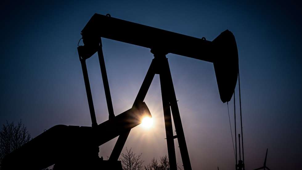 epa09842940 A pump jack of the German Wintershall Dea company conveys crude oil on an oil field near the German-Durch border in Emlichheim, Germany, 22 March 2022. The Russian invasion of Ukraine has led many governments besides Germany aiming at becoming less dependent on Russian oil and gas imports.  EPA/SASCHA STEINBACH