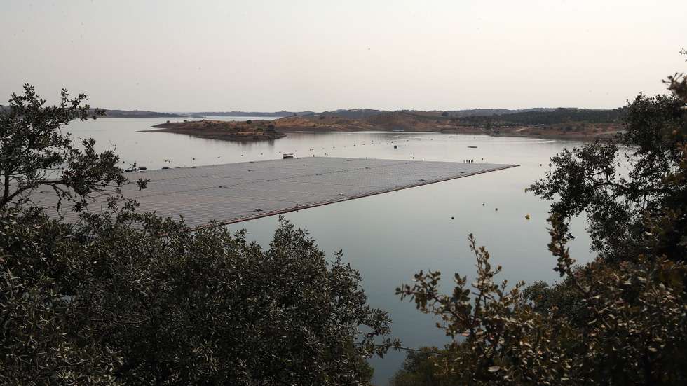 General view of the Solar Floating plant on the Alqueva dam wall at the River Guadiana, in Portel, eastern of Portugal, 15 July 2022. The Floating Solar Power Plant of Alqueva, "the largest floating solar park" in a dam reservoir in Europe, an investment of six million euros, was inaugurated today by the Prime Minister, Antonio Costa. NUNO VEIGA/LUSA