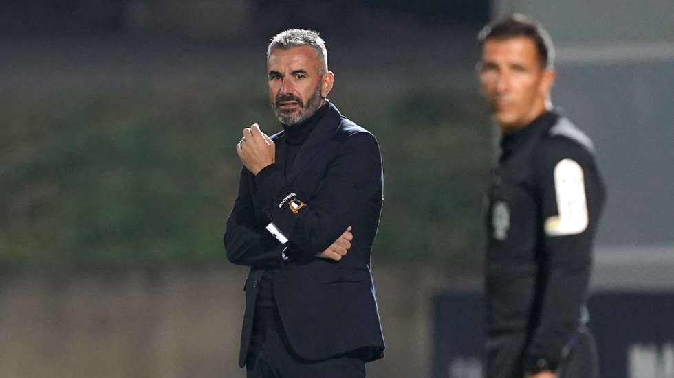 Famalicao's head coach Ivo Vieira (L) reacts during the Portuguese first league soccer match between FC Famalicao vs Benfica, held at Municipal Famalicao stadium in Famalicao, Portugal, 12 December 2021. HUGO DELGADO/LUSA