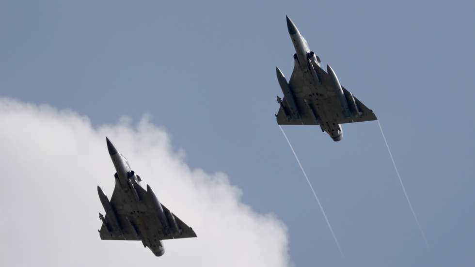 epa10109621 Two Taiwanese Air Force Mirage 2000-5 fighter jets fly by an airbase in Hsinchu, Taiwan, 07 August 2022. Following a visit of US House of Representatives Speaker Pelosi to Taiwan, the Chinese military started to hold a series of live-fire drills in six maritime areas around Taiwan's main islan from 04 to 07 August 2022.  EPA/RITCHIE B. TONGO