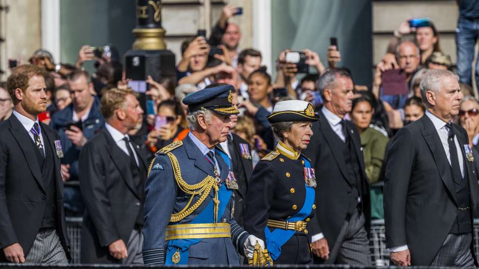 epa10183916 Britain's King Charles III (C); Princess Anne, the Princess Royal (3-R), Prince Andrew, Duke of York (R) and Prince Harry, Duke of Sussex (L) follow the coffin containing the body of Britain's Queen Elizabeth II as it is transported on a gun carriage from Buckingham Palace to Westminster Hall followed by members of the royal family in London, Britain, 14 September 2022. After a short service, the Queen's lying in state will begin, lasting for four days and ending on the morning of the state funeral on the 19 September.  EPA/GUY BELL
