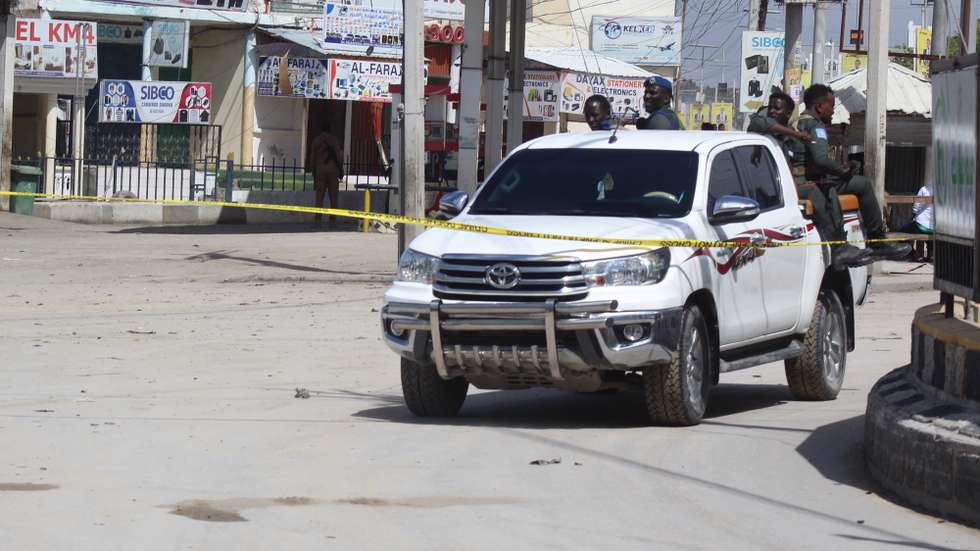 epa10130103 Somali security officials arrive at the scene of an attack at the Hayat Hotel in Mogadishu, Somalia, 20 August 2022. According to Somaliaâ€™s security officials, at least 10 people were killed in the attack reportedly carried out by al-Shabab militants on 19 August. The attack involved explosions outside the hotel and gunfire.  EPA/SAID YUSUF WARSAME