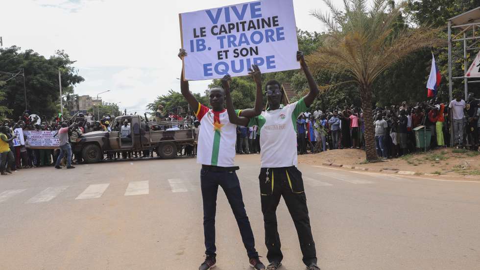 epa10220045 People attend a rally in support of the coup in Ouagadougou, Burkina Faso, 02 October 2022. Thousands of residents came out in support of the coup and protested against France and called for more involvement from Russia. On 01 October, gunshots were heard and the French embassy was set on fire a day after a coup in Ouagadougou. Burkina Faso military Colonel Ibrahim Traore announced on state television 30 September that he had seized power from Lt-Col Paul-Henri Damiba in the coup and alleged Damiba is plotting a counter-attack. In January 2022 Lt-Col Paul-Henri Damiba, ousted President Roch Kabore through a coup.  EPA/ASSANE OUEDRAOGO  EPA-EFE/ASSANE OUEDRAOGO