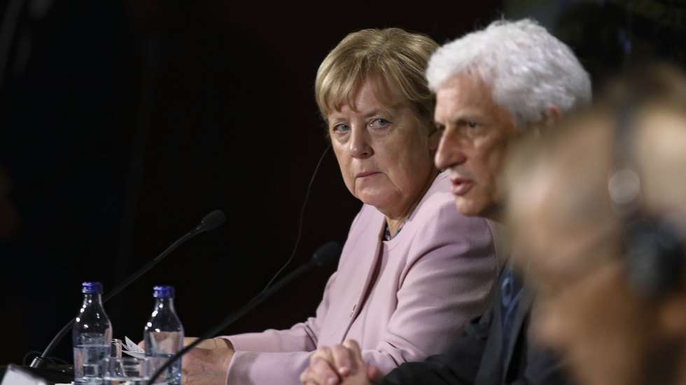 The former German chancellor and president of the prize jury Angela Merkel (L) attends a press conference to announce the winner of Gulbenkian Humanity Prize, at Calouste Gulbenkian Foundation in Lisbon, Portugal, 13 October 2022. ANDRE KOSTERS/LUSA