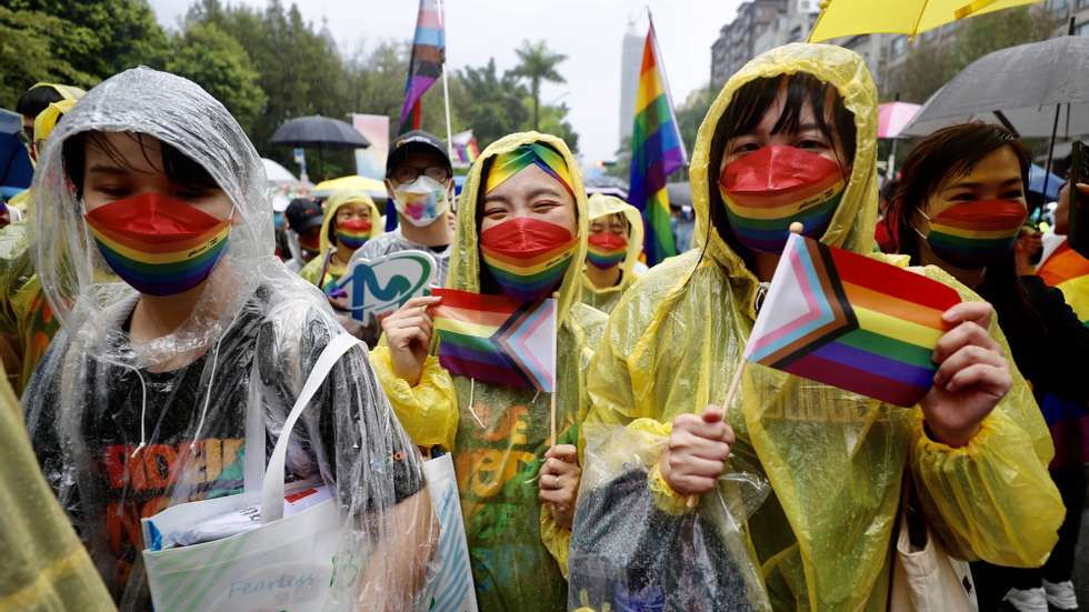 epa10272518 People attend the annual Taipei Pride March on a rainy day in Taipei, Taiwan, 29 October 2022. Following the 24 May 2019 constitutional court ruling, Taiwan became the first Asian country to recognize same-sex marriage as legal. The 20th edition of the Taiwan LGBT+ Pride march is celebrated in 2022 with the theme &#039;An Unlimited Future&#039;, as to demonstrate the infinite potential within every individual, regardless of their sexual and gender identity, according to organizers.  EPA/RITCHIE B. TONGO