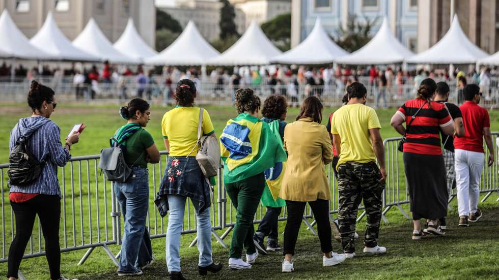 People attend to vote during the Brazilian general elections at a polling station in Lisbon, Portugal, 30 October 2022. Brazilians vote in election that will decide the next President between incumbent President Jair Bolsonaro and his leftist political nemesis, former President Luiz Inacio Lula da Silva. MIGUEL A. LOPES/LUSA