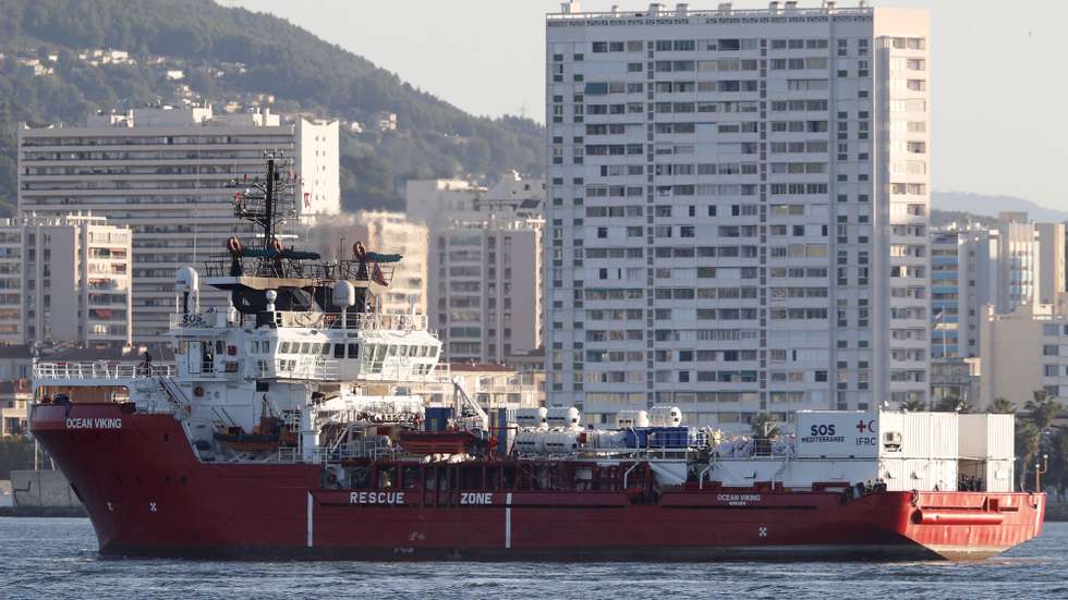 epa10299299 The Ocean Viking rescue ship, operated by French maritime-humanitarian organization SOS Mediterranee, enters the harbor in Toulon, France, 11 November 2022. SOS Mediterranee on 10 November announced receiving the green light by French authorities to allow the over 230 migrants onboard to disembark in Toulon. The vessel spent weeks at sea after rescuing migrants during several operations throughout October.  EPA/GUILLAUME HORCAJUELO