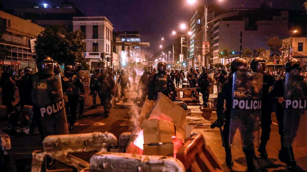 epa10361502 Police forces respond as protesters in favor of ousted President Pedro Castillo and against Congress demonstrate in the streets, in Lima, Peru, 11 December 2022. The Peruvian Congress dismissed Castillo on 07 December.  EPA/Aldair Mejia
