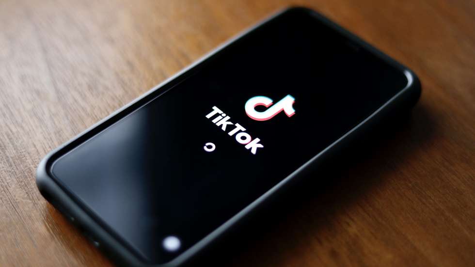 epa10351128 The Tiktok application logo is pictured on a smartphone in Taipei, Taiwan, 06 December 2022. On 02 December, the The US Federal Bureau of Investigation (FBI) warned about Tiktok, that it presents national security concerns in regards to the integrity of the application's algorithm. On 05 December, a Ministry of Digital Affairs (MODA) official announced that the application have been deemed to be 'harmful product against national information security.'  EPA/RITCHIE B. TONGO