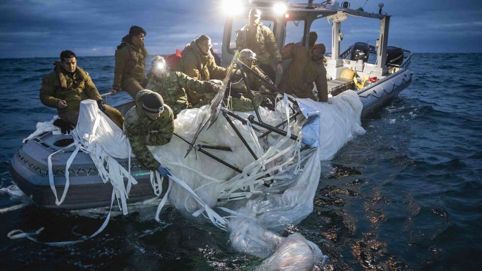 epa10453051 A handout photo made available by the US Central Command (CENTCOM) Public Affairs via the Defense Visual Information Distribution Service (DVIDS) on 07 February 2023 shows sailors assigned to Explosive Ordnance Disposal Group 2 recover a high-altitude surveillance balloon off the coast of Myrtle Beach, South Carolina, 05 February 2023 (issued 07 February 2023). At the direction of the US President and with the full support of Canada's Government, U.S. fighter aircrafts under U.S. Northern Command authority engaged and brought down a high altitude surveillance balloon within sovereign U.S. airspace and over U.S. territorial waters 04 February 2023, according to the US Navy.  EPA/US Navy/Mass Communication Specialist 1st Class Tyler Thompson /  HANDOUT EDITORIAL USE ONLY/NO SALES