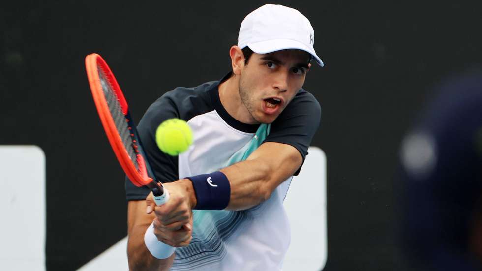 epa10408381 Nuno Borges of Portugal in action against Lorenzo Sonego of Italy during their first round match at the Australian Open tennis tournament in Melbourne, Australia, 16 January 2023.  EPA/FAZRY ISMAIL