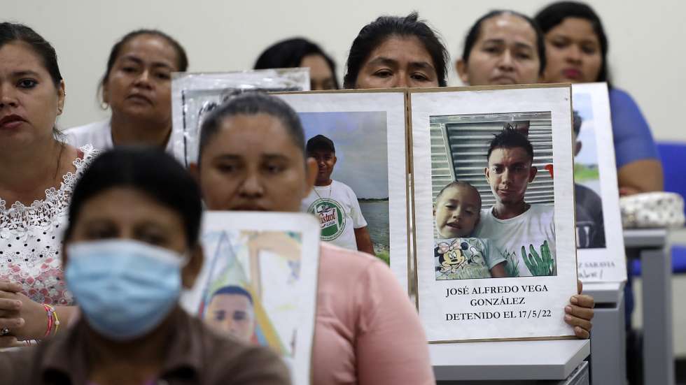 epa10514195 Relatives of people detained under the emergency regime show their photographs during a press conference, in San Salvador, El Salvador, 10 March 2023. The relatives of 66 people detained in the remote area of Bajo Lempa, in eastern El Salvador, denounced the Salvadoran State before the Inter-American Commission on Human Rights (IACHR) on 07 March for the 'systematic violation' of their rights.  EPA/Rodrigo Sura