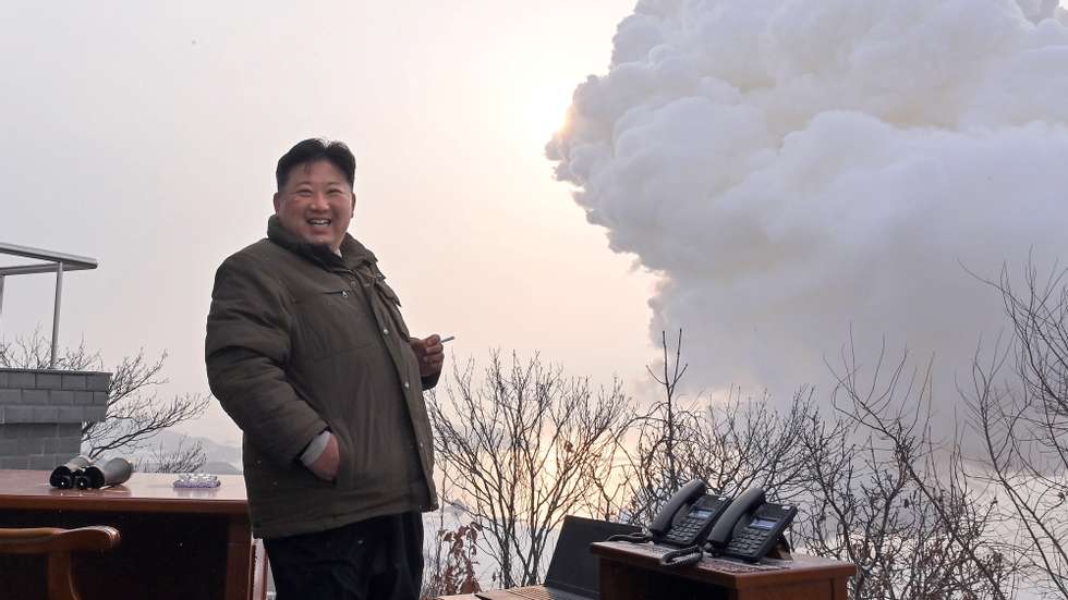 epa10368356 A photo released by the official North Korean Central News Agency (KCNA) shows North Korean Supreme Leader Kim Jong-un reacting after a ground test of a &#039;high-thrust solid-fuel motor&#039;, conducted at Sohae Satellite Launching Ground in Cholsan, North Pyongan Province, North Korea, 15 December 2022 (issued 16 December 2022).  EPA/KCNA   EDITORIAL USE ONLY