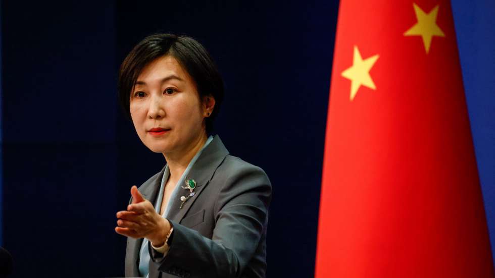 epa10493519 China's Foreign Ministry spokesperson Mao Ning gestures during a press conference at the Ministry of Foreign Affairs in Beijing, China, 27 February 2023. The US has warned China that lethal aid to Russia for the war on Ukraine would come at real costs, said White House national security adviser Jake Sullivan on 26 February, while the US Department of Energy said that the COVID-19 pandemic likely came from a Chinese laboratory leak.  EPA/MARK R. CRISTINO