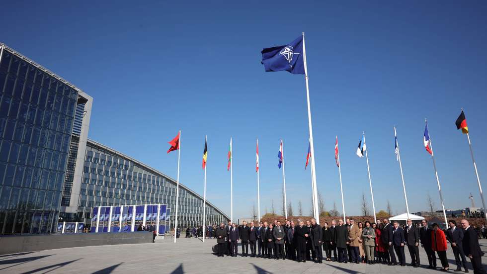 epa10558259 Officials attend a flag-raising ceremony for Finland's accession during NATO foreign ministers' meeting at the Alliance's headquarters in Brussels, Belgium, 04 April 2023. Finland becomes the 31st member of the Alliance on 04 April.  EPA/OLIVIER MATTHYS / POOL