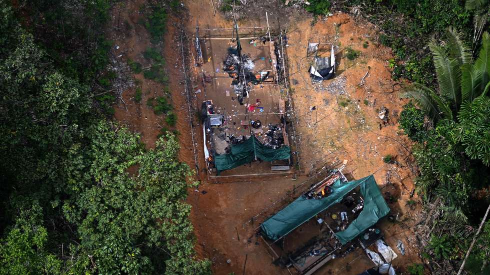 epa10469401 An illegal miners camp is seen during an operation by Brazilian authorities against the advance of deforestation and illegal mining in the Itaituba II Environmental Forest, Brazil, 15 February 2023. The surroundings of Itaituba, in the state of Para in northern Brazil, is one of the areas of the jungle most affected by deforestation.  EPA/Andre Borges