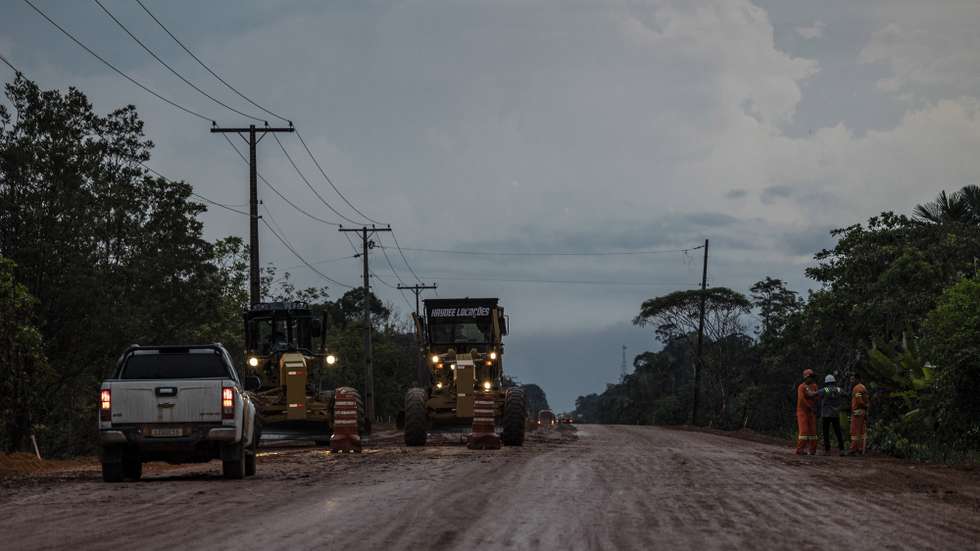 epa10180077 View of the construction on the BR-319 highway, It is the only highway that connects the city of Mannose with the south of Brazil, 06 September 2022 (issued 12 September 2022). Deforestation and fires coexist, side by side, with the asphalting works of BR-319, the controversial Brazilian highway that is leaving a trail of devastation as it passes through the Amazon.  EPA/Raphael Alves