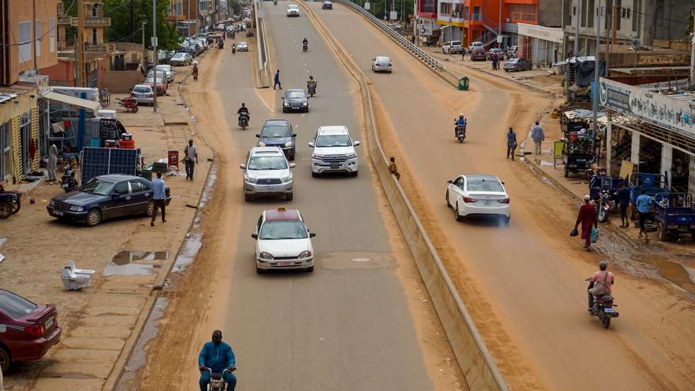 epa10789559 Cars drive on a main road in Niamey, Niger, 07 August 2023. Nigerâ€™s junta closed the countryâ€™s airspace and accused foreign powers of preparing an attack, after the junta defied a deadline to restore ousted President Mohamed Bazoum.  EPA/ISSIFOU DJIBO