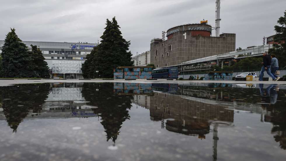 epa10692609 A picture taken during a visit to Enerhodar organised by the Russian Defence ministry shows a general view of the Zaporizhzhia Nuclear Power Plant in Enerhodar, southeastern Ukraine, 14 June 2023. The Zaporizhzhia Nuclear Power Plant can still continue to draw water from the Kakhovka reservoir, the IAEA reports. Grossi said that after the destruction of the Kakhovka hydroelectric power station, a situation may arise when the water from the Kakhovka reservoir will not be enough to cool the reactors of the Zaporozhye nuclear power plant. According to him, in this case, the reactors can be damaged, which threatens with the onset of radiological consequences. The water level in the reservoir near the Zaporizhzhya TPP has dropped to 11.27 meters and continues to decline.  EPA/SERGEI ILNITSKY PICTURE MADE AVAILABLE TODAY
