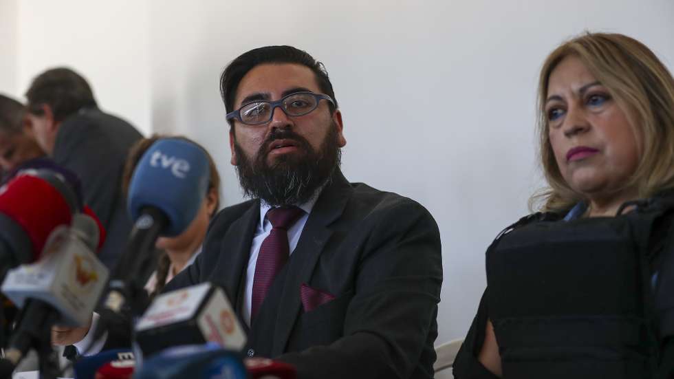 epa10806173 Lawyer Marco Ayulema (L) and the sister of the presidential candidate assassinated last week, Fernando Villavicencio, Patricia Villavicencio (R), hold a press conference, in Quito, Ecuador, 18 August 2023. Relatives of the presidential candidate assassinated last week, Fernando Villavicencio, filed a complaint this 18 August for the crime of 'murder by intentional omission' against President, Guillermo Lasso, as a representative of the state, and against other authorities.  EPA/Jose Jacome
