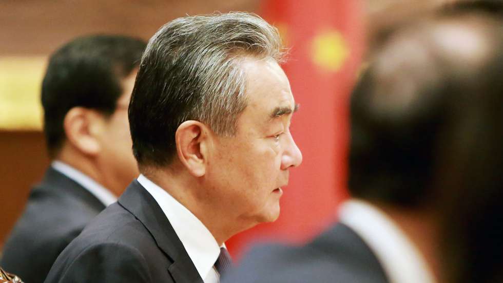 epa10798236 Chinese Foreign Minister Wang Yi (C) attends a meeting at the Ministry of Foreign Affairs and International Cooperation in Phnom Penh, Cambodia, 13 August 2023. Wang Yi is on an official visit in Cambodia to strengthen ties and cooperation between the two countries.  EPA/KITH SEREY