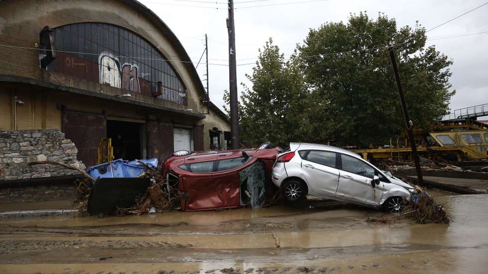 epa10843212 Damaged cars are seen during the storm named Daniel in the area of Volos, Magnesia, Greece, 06 September 2023. The storm 'Daniel' sweeping through most of Greece with heavy rain and lightning caused extensive damage in the power network at Volos, Mt. Pilio, elsewhere in the Magnissia prefecture, as well as in the Sporades Islands.  EPA/YANNIS KOLESIDIS