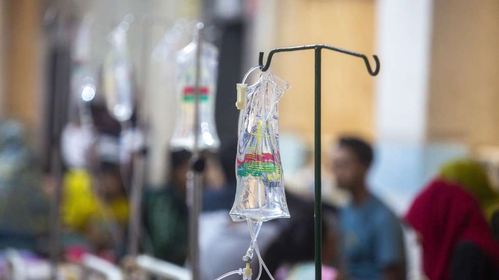 epa10801070 A saline packet with a drip-feed next to a hospital bed as young patients receive treatment for dengue fever at Mugda Medical College and Hospital in Dhaka, Bangladesh, 15 August 2023. According to the Directorate General of Health Services (DGHS), in the last 24 hours, 2,480 dengue patients, including 919 in the capital, are receiving treatment at hospitals across the country. So far, 87,891 dengue cases have been recorded this year, with 78,044 recoveries and 416 deaths.  EPA/MONIRUL ALAM