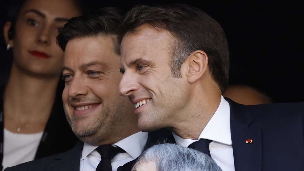 epa10879008 French President Emmanuel Macron (R) and the Mayor of Marseille Benoit Payan (C) attend a mass with Pope Francis (not pictured) inside the Velodrome stadium in Marseille, France, 23 September 2023. Pope Francis, the first pontiff in 500 years to visit Marseille, is on a two-day visit to the city, marking his 44th Apostolic Journey abroad.  EPA/Sebastien Nogier / POOL