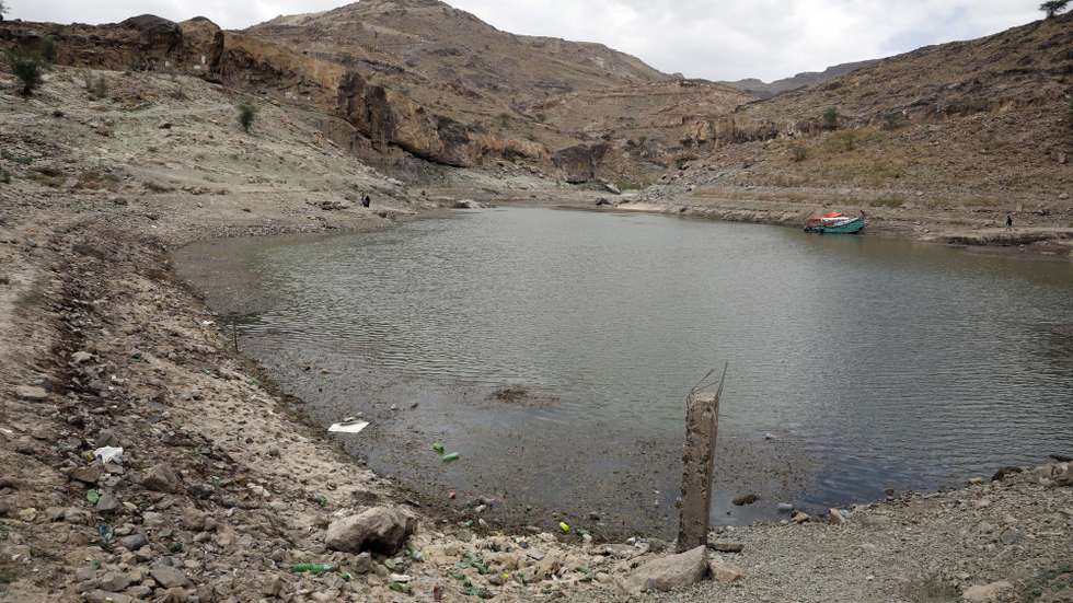 epa10817787 A drought-affected water reservoir during hot weather on the outskirts of Sana'a, Yemen, 24 August 2023. The combination of a serious water shortage and the negative impacts of climate change, including low and intermittent rainfalls and droughts, in Yemen has aggravated water scarcity with over 17 million people out of the war-ravaged countryâ€™s 30-million population lacking access to safe water, according to estimates by the United Nations. Yemen is one of the most water-scarce countries in the world as it has no rivers, and rainfall has decreased significantly over the last few decades.  EPA/YAHYA ARHAB