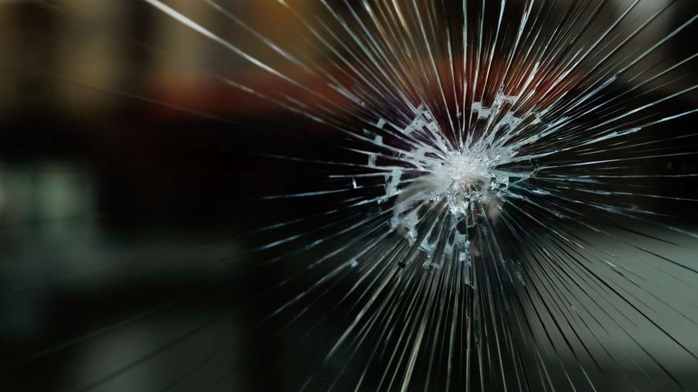 epa10602660 Broken glass on a store which was vandalized during the annual May Day march in Paris, France, 01 May 2023. Despite the Constitutional Council's adoption of the law on 14 April raising the retirement age in France from 62 to 64 years old, protests against pension reform are being held in France on this International Workers' Day. Following the filing of a new appeal by the left-wing senators, a new decision is expected on 03 May.  EPA/TERESA SUAREZ