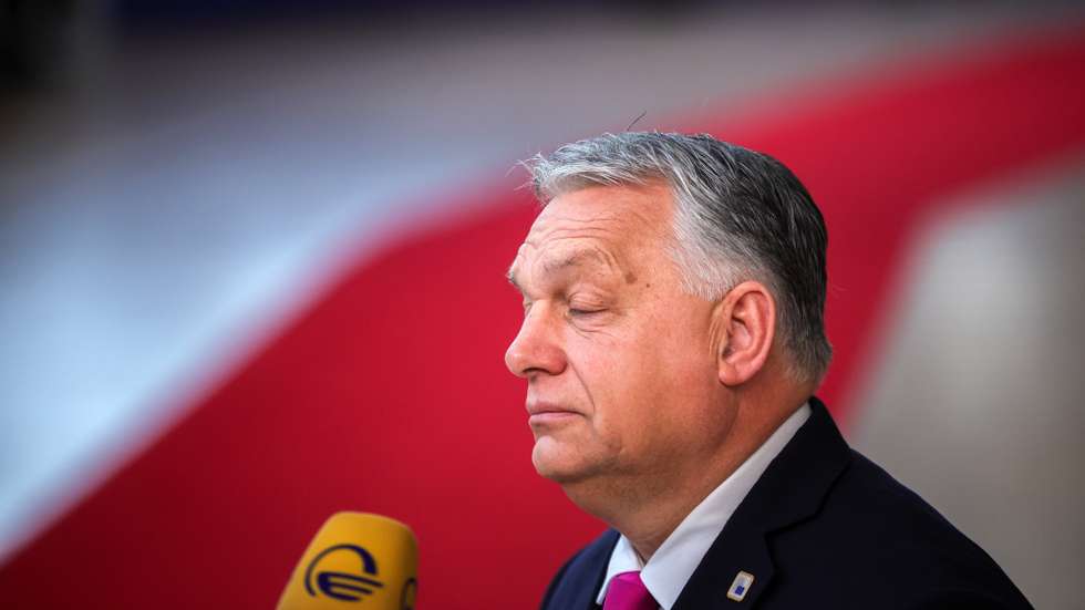 epa11028757 Hungary's Prime Minister Viktor Orban speaks to the media as he arrives for a European Council in Brussels, Belgium, 14 December 2023. EU leaders are gathering in Brussels for a two-day summit to discuss the latest developments in relation to Russia's invasion of Ukraine, and in the Middle East, including the humanitarian situation in Gaza, the block's enlargement policy and long-term budget 2021-2027, as well as security and defense among other topics.  EPA/OLIVIER MATTHYS