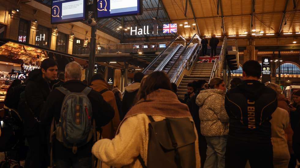 epa11040069 People wait next to the London departures hall, as trips to London are cancelled due to employees strike in Getlink company, in Gare de Nord, in Paris, France, 21 December 2023. French workers at Getlink, the company that operates the tunnel between mainland Europe and the UK, started a surprise strike on 21 December blocking the train traffic in the peak holiday season. Worker unions are asking Getlink to triple the end-of-the-year bonus for all employees.  EPA/Mohammed Badra