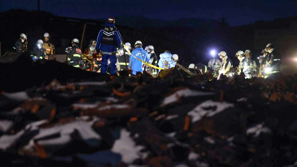 epa11063086 Police forces search for victims in the burned down Asaichi market following a powerful earthquake hit the region in Wajima, Ishikawa Prefecture, Japan, 07 January 2024 (issued 08 January 2024). At least 120 people were killed following a magnitude 7 earthquake (the USGS listed the earthquake as 7.5 magnitude) which occurred on 01 January according to the Ishikawa Prefecture Government. About 33,000 residents in Ishikawa Prefecture have evacuated to 355 makeshift evacuation centers.  EPA/JIJI PRESS JAPAN OUT EDITORIAL USE ONLY/