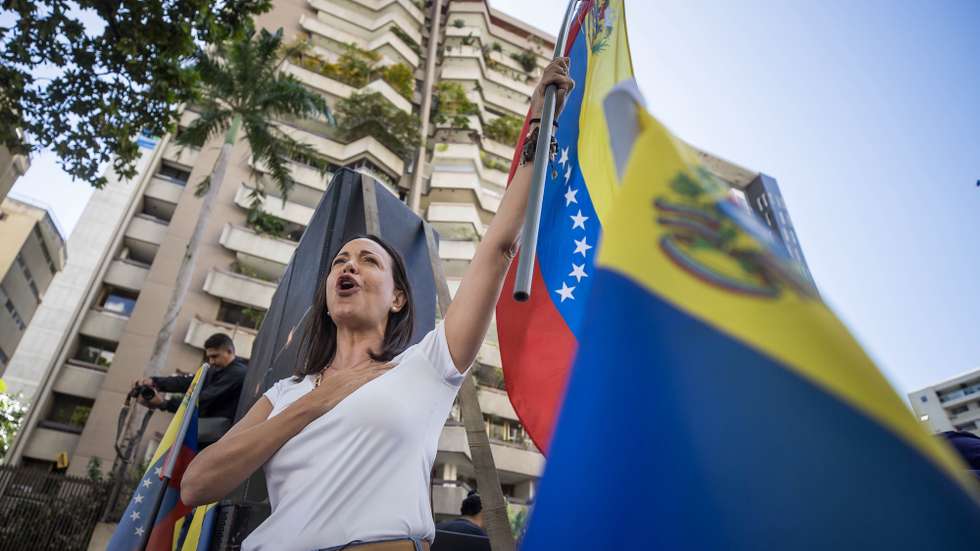 epaselect epa11099320 The Venezuelan presidential candidate for the opposition Maria Corina Machado participates in a demonstration on the occasion of the 66th anniversary of the overthrow of the dictatorship of Marcos Perez Jimenez (1953-1958), in Caracas, Venezuela, 23 January 2024. The Democratic Unitary Platform (PUD), the main opposition bloc in Venezuela, insisted on the need for the National Electoral Council (CNE) to announce as soon as possible the date of the presidential elections, scheduled for the second half of the year.  EPA/Miguel Gutierrez