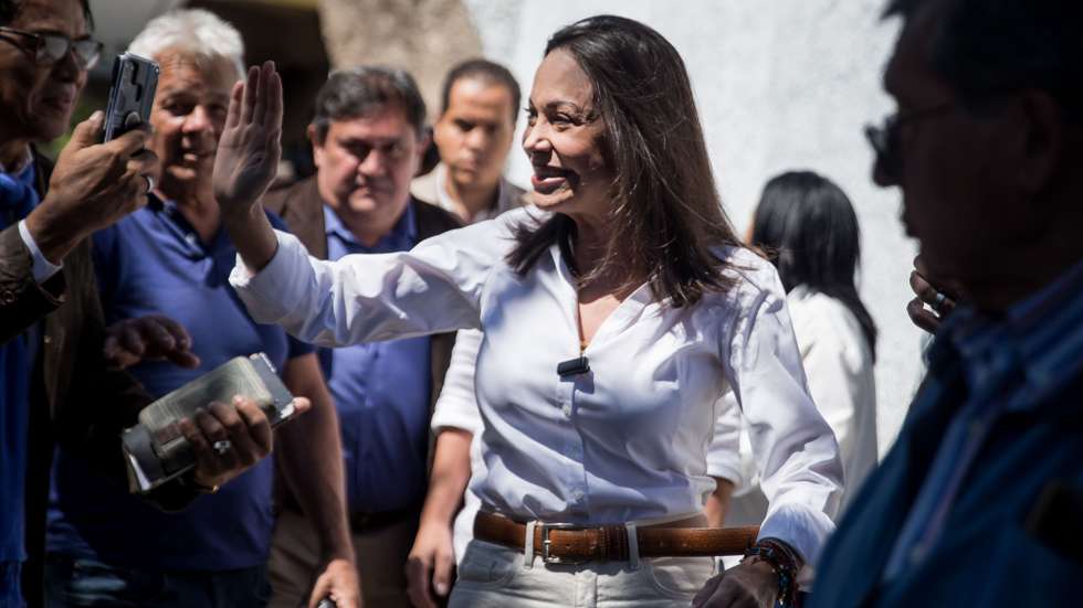 epaselect epa11112841 Venezuelan opposition leader Maria Corina Machado greets her followers during a rally in Caracas, Venezuela, 29 January 2024. Machado assured on 29 janaury that she will run in this year's presidential elections, as candidate of the largest anti-Chavez bloc, despite the ruling of the Supreme Court of Justice (TSJ) issued on published on 26 Janaury stating that she is disqualified to participate in elections until 2036.  EPA/MIGUEL GUTIERREZ