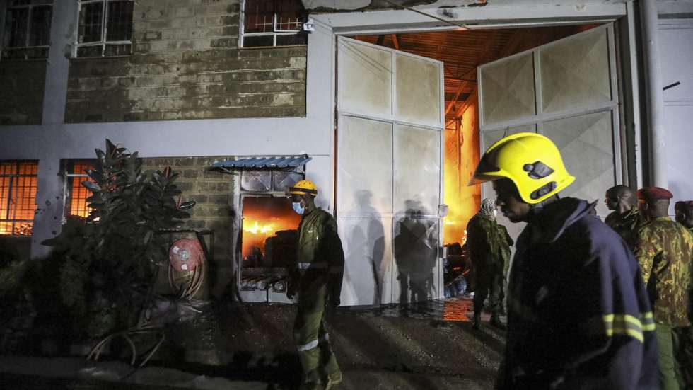 epa11119171 Firefighters try to put-off a fire in a residential area, after a fire caused explosions in an industrial company in Embakasi, Nairobi, Kenya, 02 February 2023. Government Spokesperson Isaac Mwaura in a statement on 'X' platform said that a fire broke out at Kentainers Company ltd near Kabansora in Embakasi, Nairobi, during the refilling of gas cylinders. The cause of the fire remains unknown. According to the Kenya Red Cross, response units evacuated 271 people to different health facilities in Nairobi, while attending to an extra 27 individuals on-site.  EPA/DANIEL IRUNGU