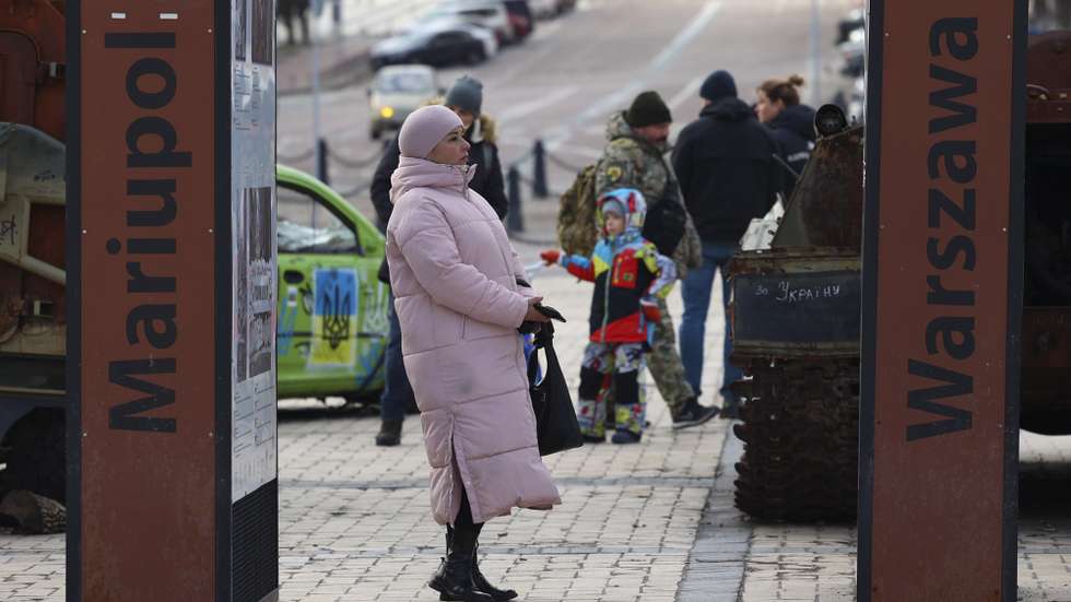 People observe russian combat cars, destroyed by the ukrainian army during an exhibition at Sofievskaya Square, in Kiev, Ukraine, 04 February 2024. ANTONIO COTRIM/LUSA