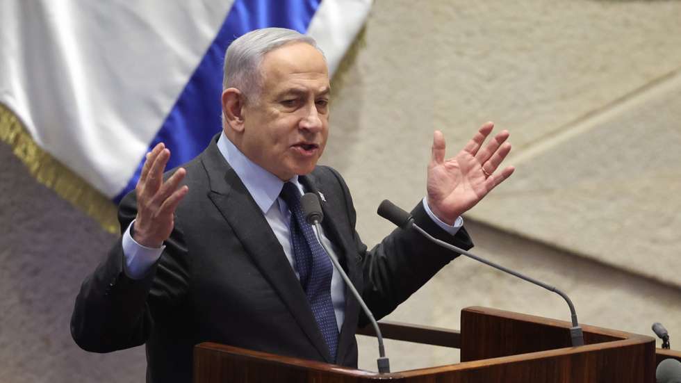 epa11166726 Israeli Prime Minister Benjamin Netanyahu speaks during the voting session for the impeachment of Hadash-Ta’al party MP Ofer Cassif in Jerusalem, 19 February 2024. The motion was brought up after Cassif publicly supported South Africa’s genocide case against Israel at the International Court of Justice (ICJ).  EPA/ABIR SULTAN