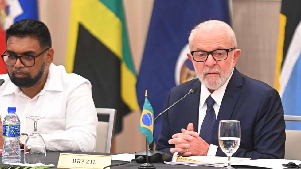 epa11187411 Brazilian President Luiz Inacio Lula da Silva (R) participates in the summit of the Caribbean Community (Caricom) in Georgetown, Guyana, 28 February 2024. Lula arrived in Guyana to attend the summit of the Caribbean Community (Caricom). The meeting of this bloc of fifteen Caribbean countries, mostly English-speaking, is held in the capital of Guyana from 25 to 28 February.  EPA/NAZIMA RAGHUBIR