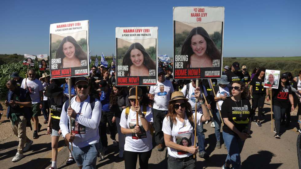 epa11188008 Families of hostages held by Hamas in Gaza participate in the second day of a four-day march to Jerusalem, near the city of Kiryat Gat, southern Israel, 29 February 2024. Families started on 28 February their four-day march to Jerusalem where they will hold a rally in front of the Knesset on 02 March, to call for the immediate release of 134 Israeli hostages held in Gaza. Thousands of Israelis and Palestinians have been killed since the militant group Hamas launched an unprecedented attack on Israel from the Gaza Strip on 07 October 2023, and the Israeli strikes on the Palestinian enclave which followed it.  EPA/ABIR SULTAN