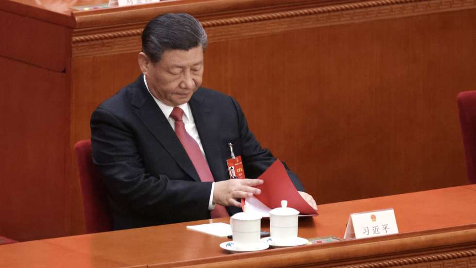 epa11213960 Chinese President Xi Jinping checks documents during the closing meeting of the second session of the 14th National People's Congress (NPC) at the Great Hall of the People in Beijing, China, 11 March 2024. China holds two major annual political meetings, the National People's Congress (NPC) and the Chinese People's Political Consultative Conference (CPPCC), which run alongside each other and are known as 'Lianghui' or 'Two Sessions.'  EPA/ANDRES MARTINEZ CASARES