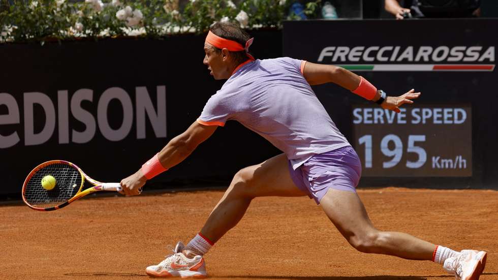 epa11333056 Rafael Nadal of Spain in acation during his men's singles 2nd round match against Hubert Hurkacz of Poland (not pictured) at the Italian Open tennis tournament in Rome, Italy, 11 May 2024.  EPA/FABIO FRUSTACI